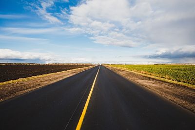 Open road with blue sky in the background