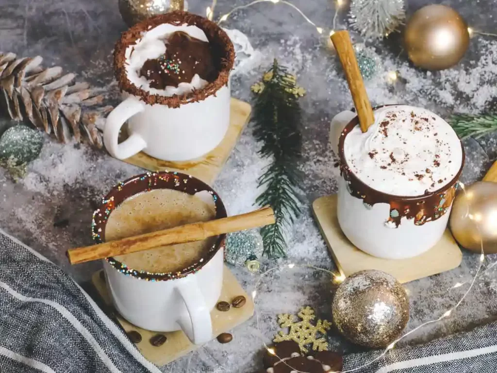 three hot chocolate mugs with different toppings