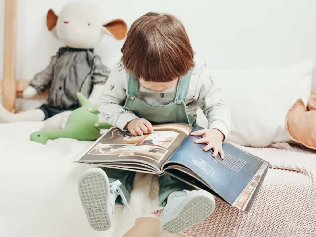 kid reading a book