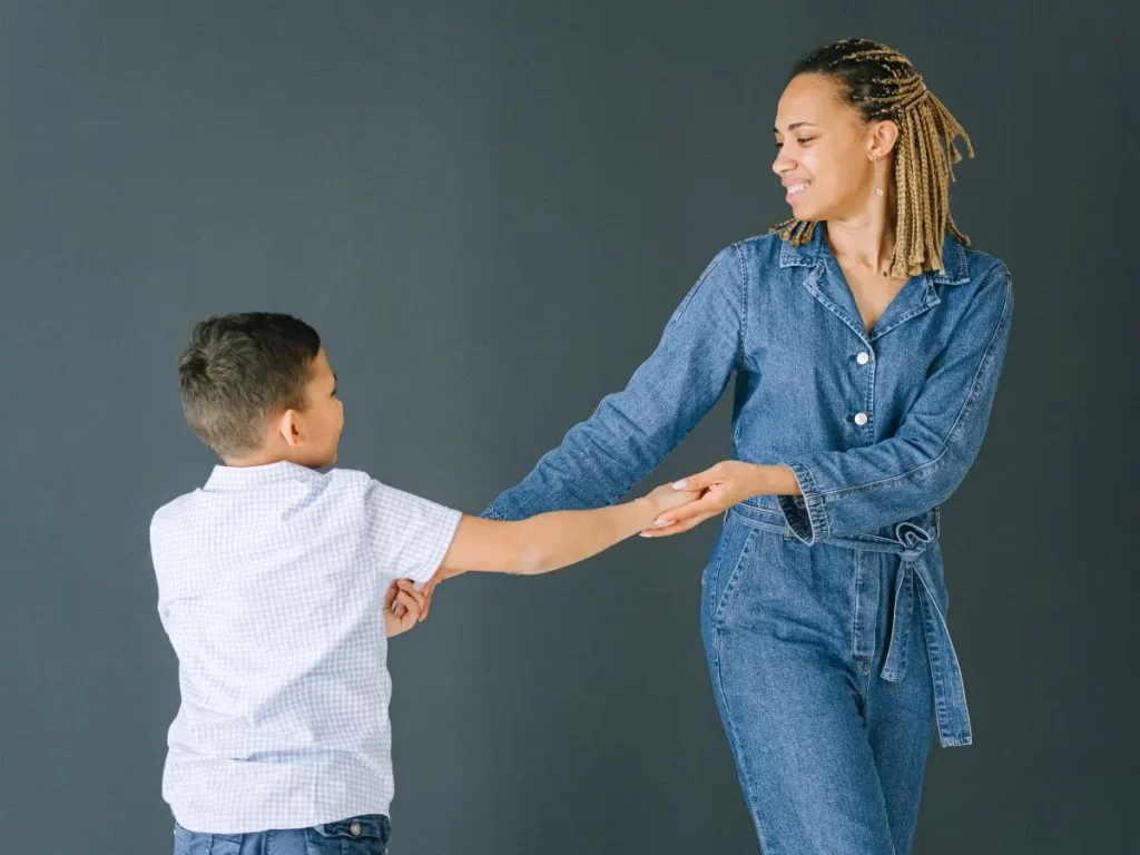 Mother and son dancing